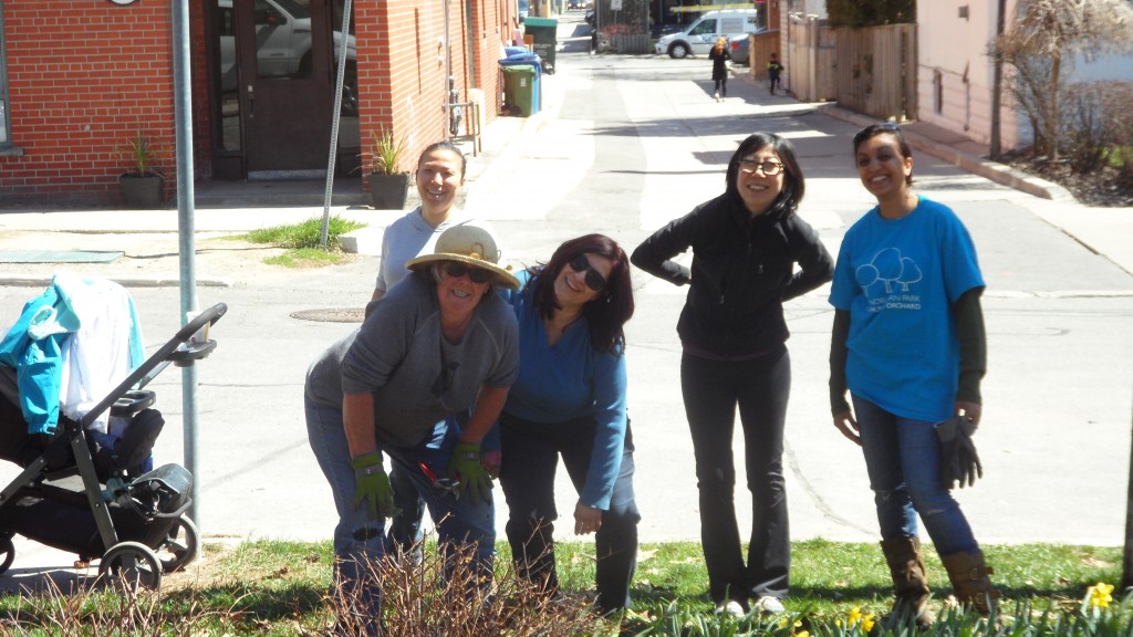 The Stewardship team from Ben Nobleman Park Community Orchard struts their stuff after a few hours of working in the pollinator garden. 